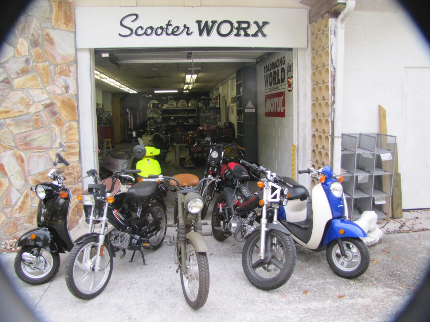 The lineup in front of Scooter WORX: Vino, Tomos, Sears AllState, MadAss, Metropolitan